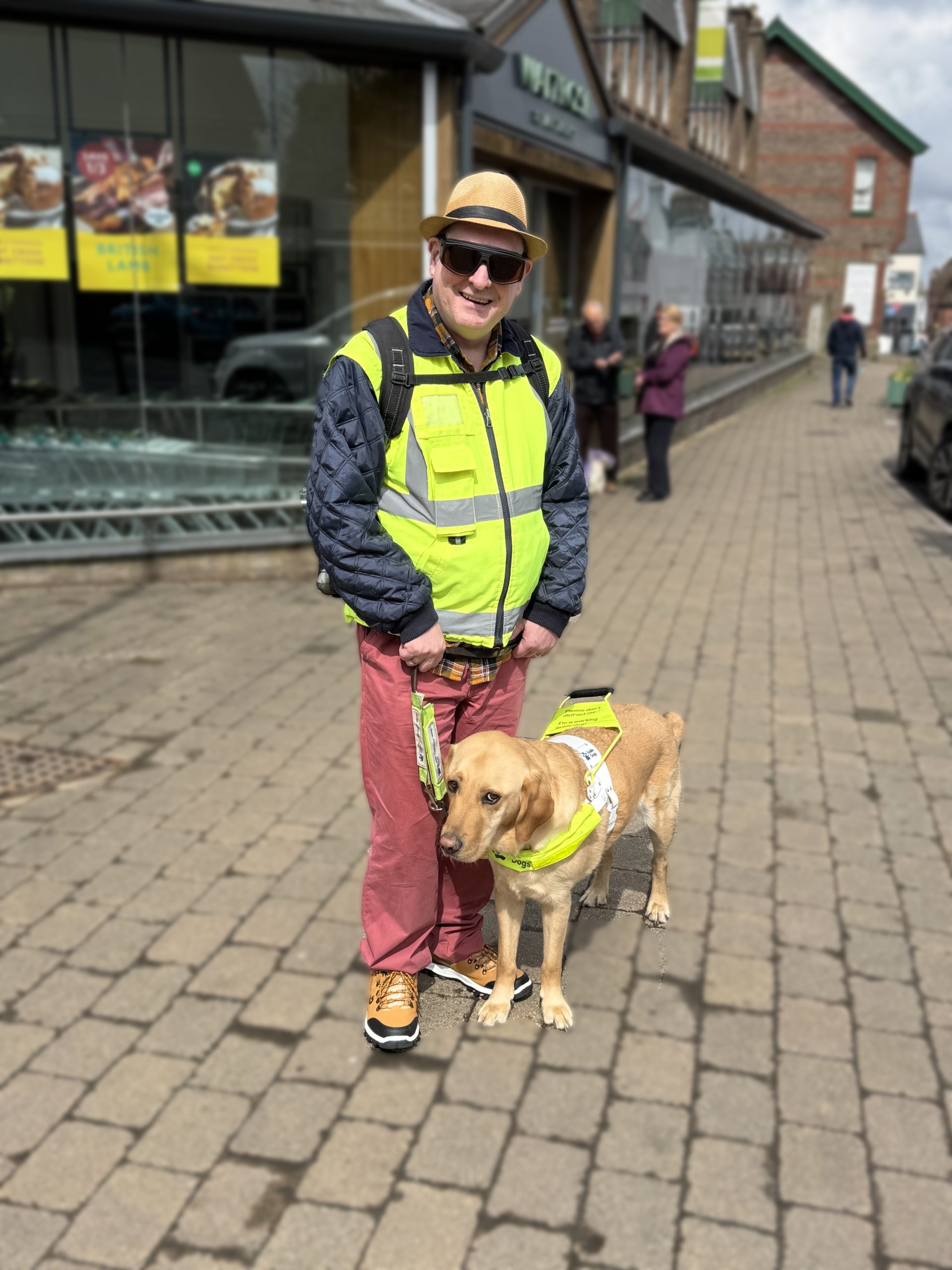 Photo of Cllr Paul Goddard with his guide dog Stevie