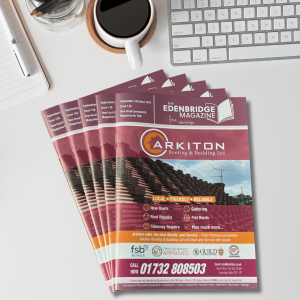 Issues of the Edenbridge Magazine fanned out on a desk